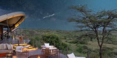 Serengeti Serena Safari Lodge Mara Region Tanzania with elephants at sunset